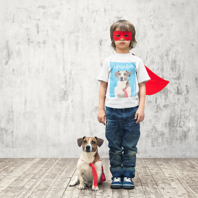 Boy wearing is personalized t-shirt pop art of his dog created from a photo