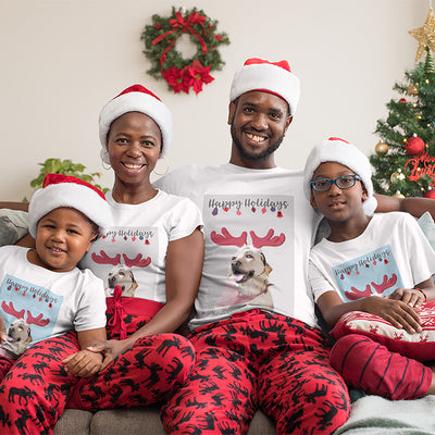 Happy Family wearing their matching custom dog art t-shirt during holiday season